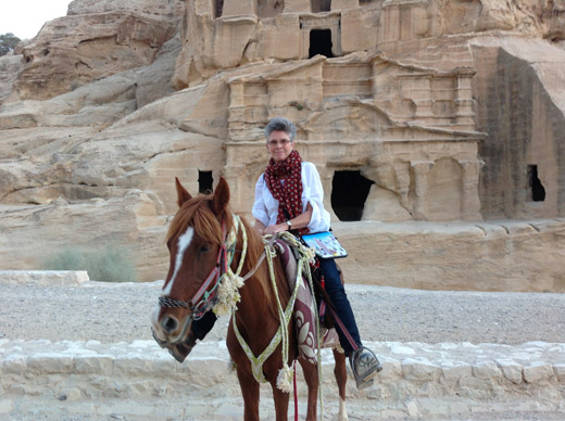 Riding out of Petra on my free horse